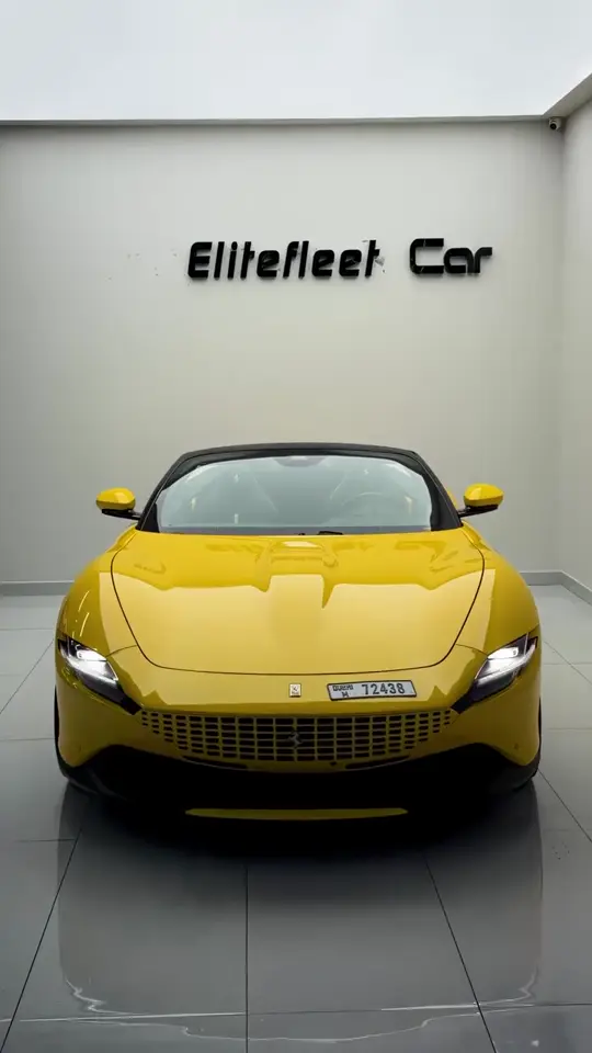 Yellow Ferrari Roma Spider in the EliteFleet showroom